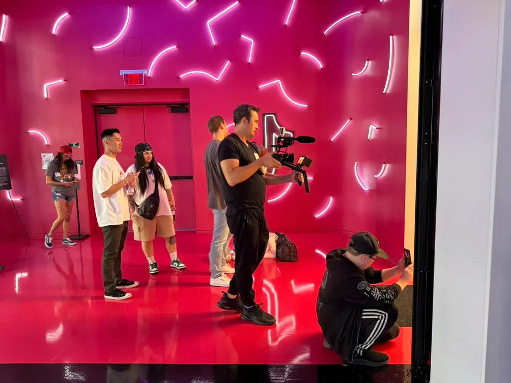A creator campaign production team filming in a brightly lit studio